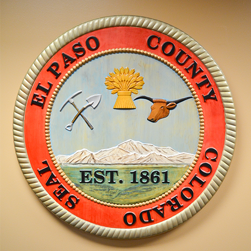 Painted wooden county seal Painted wooden county seal