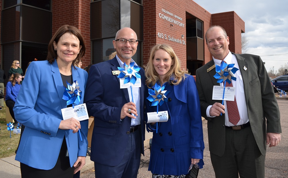 From left, El Paso County Department of Human Services Director Julie Krow, Commissioner Longinos Gonzalez Jr., Commissioner Cami Bremer, and Commissioner Stan VanderWerf at Colorado Springs Conservatory Monday, April 1, 2019, to mark the beginning of national Child Abuse Prevention Month.