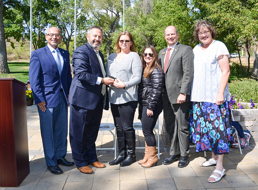 Commissioners with Connie France for 2019 Veteran of the Year